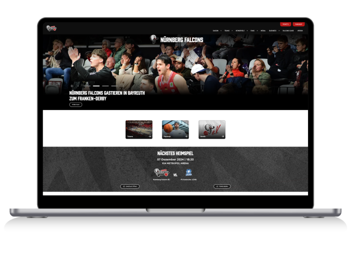 Auf einem Laptop wird die Nürnberg Falcons Startseite angezeigt.